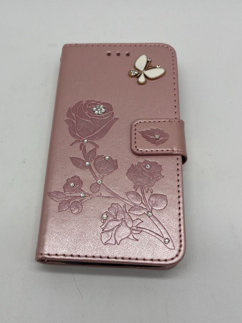 Rose Embossed Pink Wallet Phone Case with Butterfly Accent